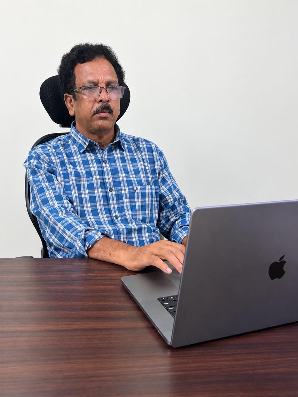 K.V.S. Naidu — Founder & Proprietor